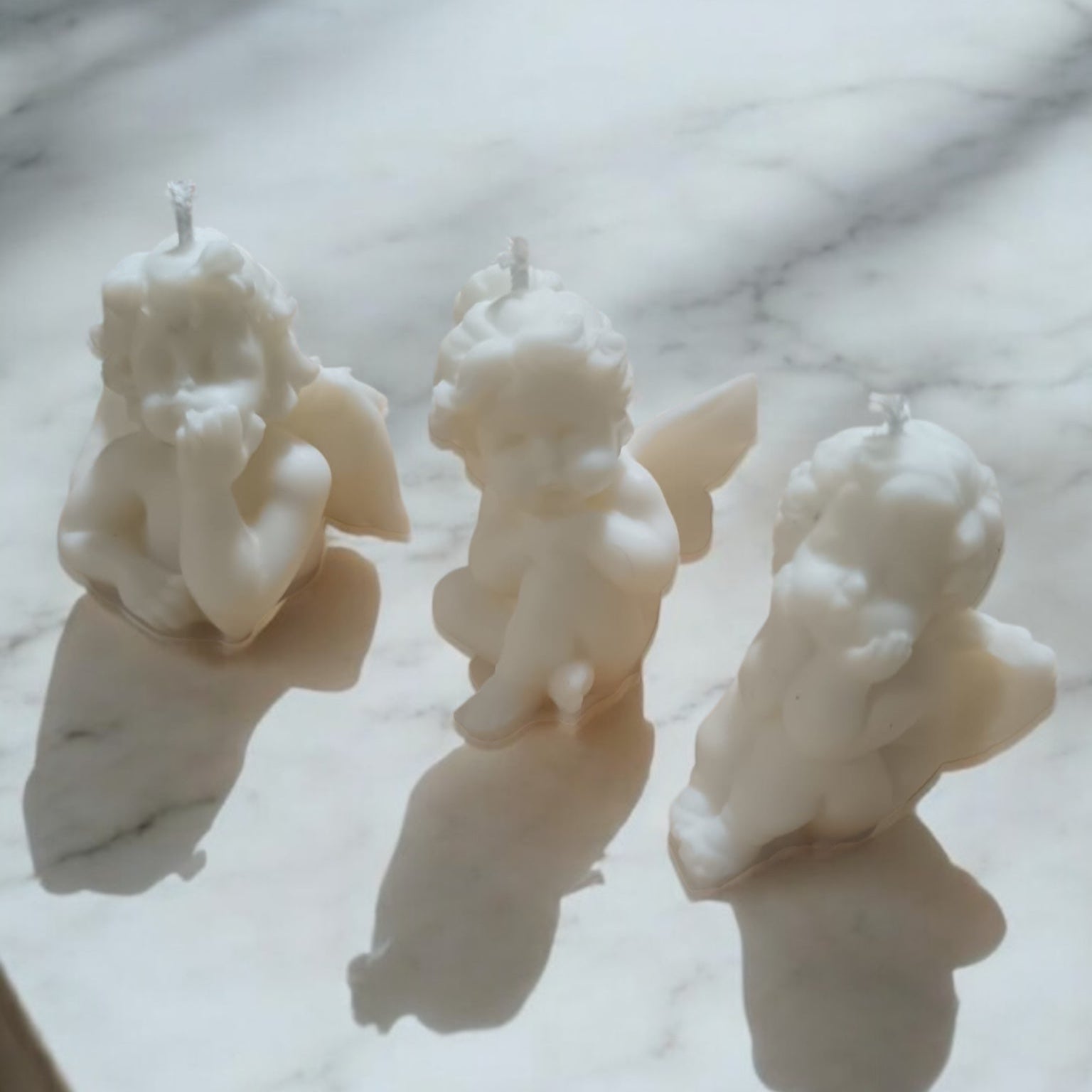 Set di candele Angioletti in cera vegetale profumata, realizzate a mano da Essenza di Luce.